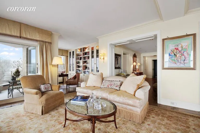 New York City Real Estate | View 200 East End Avenue, 6EF | Living Room and Library/Home-Office | View 2