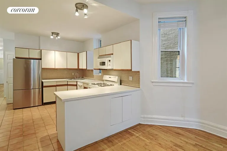 New York City Real Estate | View 64 7th Avenue, 2F | Kitchen & Dining Area | View 3