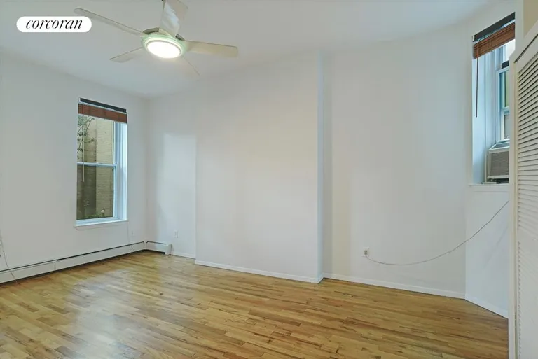 New York City Real Estate | View 64 7th Avenue, 2F | Master Bedroom | View 2