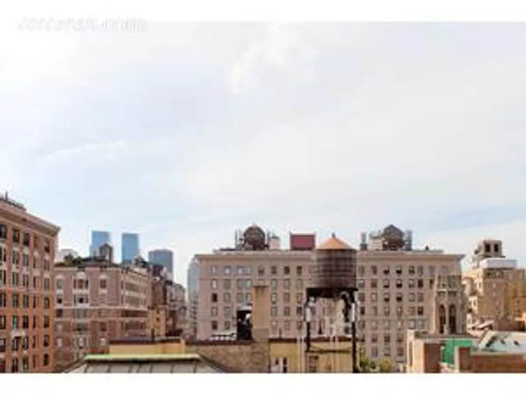 New York City Real Estate | View 136 East 64th Street, 11F | Western view from 2nd BR | View 8