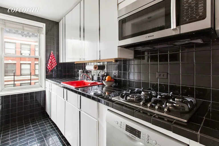 New York City Real Estate | View 88 Bleecker Street, 6F | Windowed kitchen with lots of storage | View 3