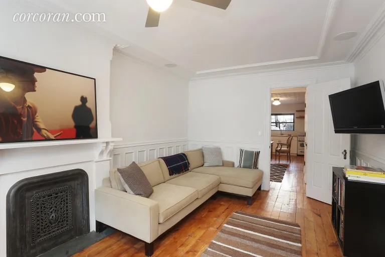 New York City Real Estate | View 515 10th Street | Living room with decorative fireplace | View 4