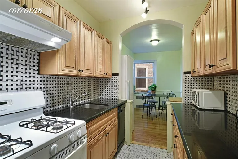 New York City Real Estate | View 901 Avenue H, 1H | Cheerful kitchen... | View 3