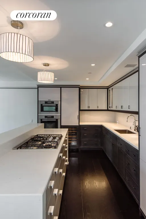 New York City Real Estate | View 21 East 61st Street, 10A | Designer Kitchen | View 2