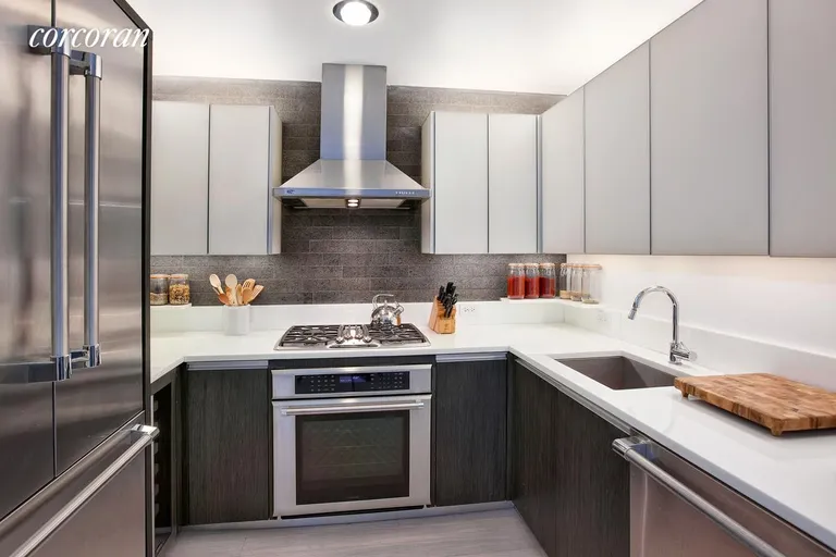 New York City Real Estate | View 247 West 46th Street, 1505 | Chef's kitchen with lots of counter space  | View 3