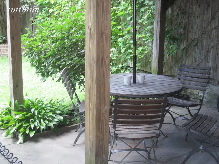 New York City Real Estate | View 160 Hoyt Street, 1 | Private patio with garden view | View 3