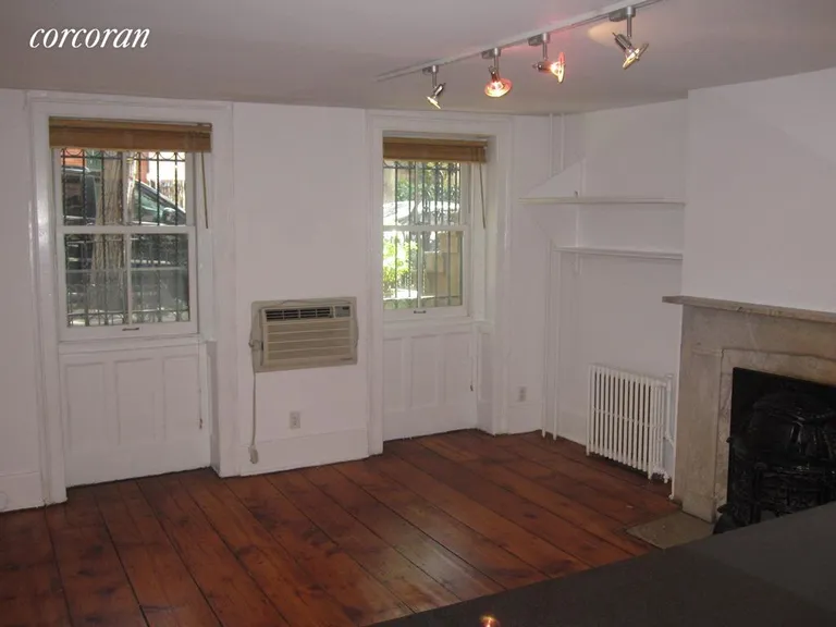 New York City Real Estate | View 160 Hoyt Street, 1 | Living Room with working fireplace | View 4