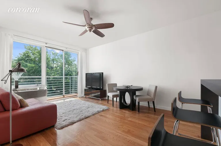 New York City Real Estate | View 111 Monroe Street, 3D | 2 - Living Room with Juliette Balcony | View 2