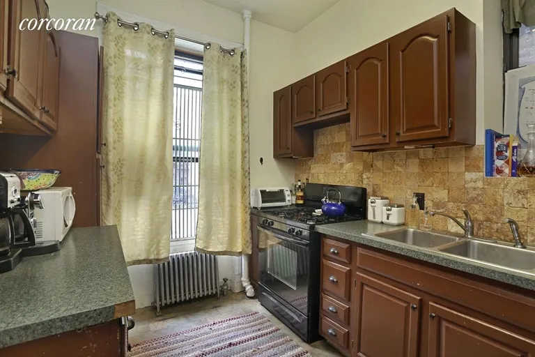 New York City Real Estate | View 348 West 48th Street, 1W | Windowed kitchen | View 3
