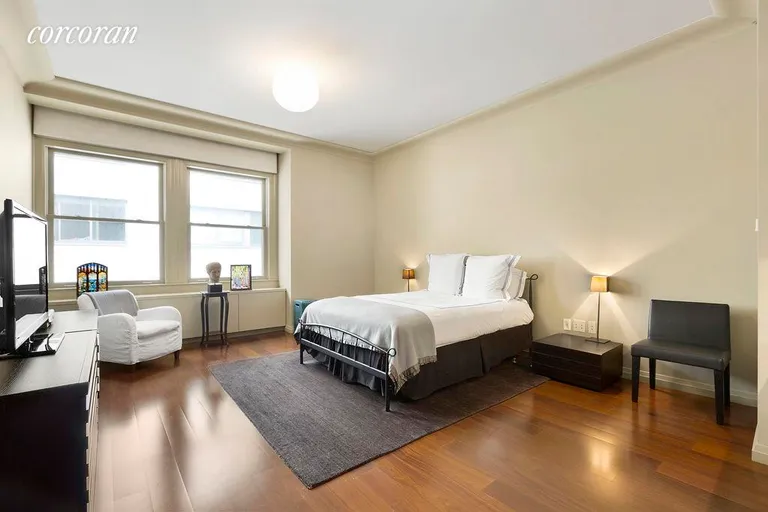 New York City Real Estate | View 55 Wall Street, 804 | Spacious bedroom with en suite bath | View 2