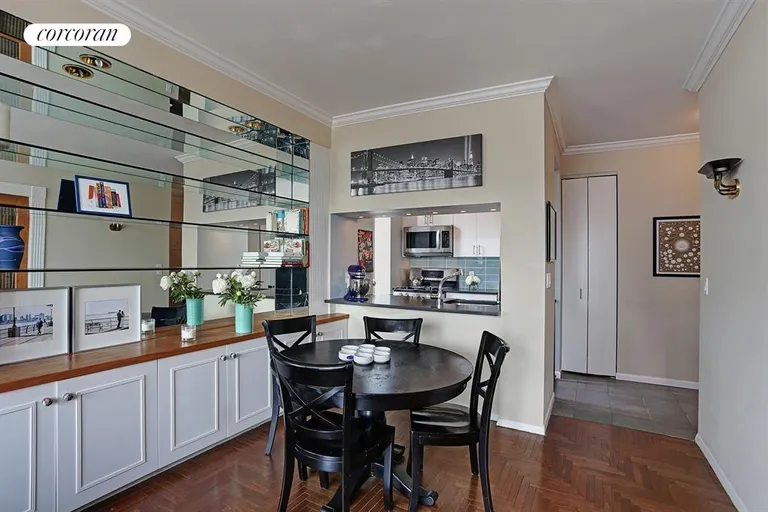 New York City Real Estate | View 524 East 72Nd Street, 23D | Dining Area with View into the Kitchen | View 6