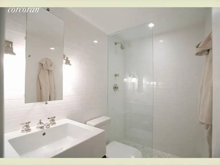 New York City Real Estate | View 468 West 23rd Street, 5R | Downstairs renovated bathroom | View 4