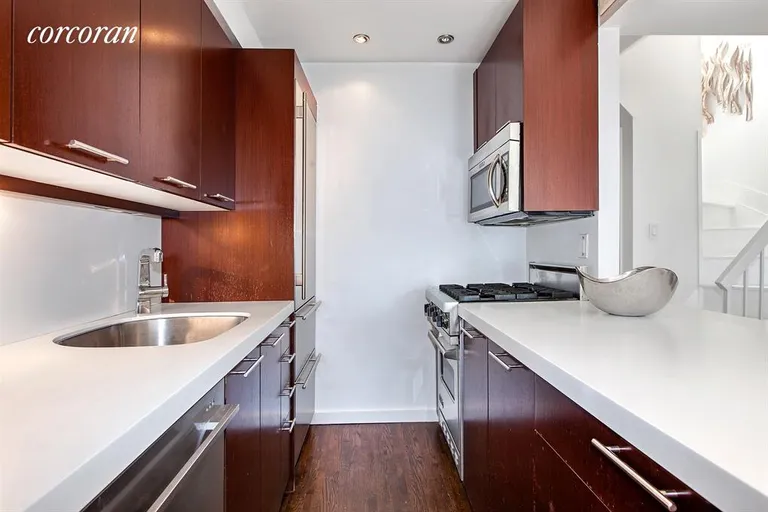 New York City Real Estate | View 468 West 23rd Street, 5R | Top of the line appliances and breakfast bar | View 6