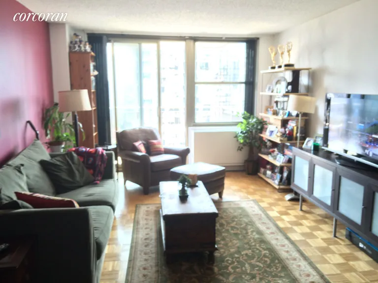New York City Real Estate | View 301 East 79th Street, 21S | Sunny and Spacious Living Room | View 2
