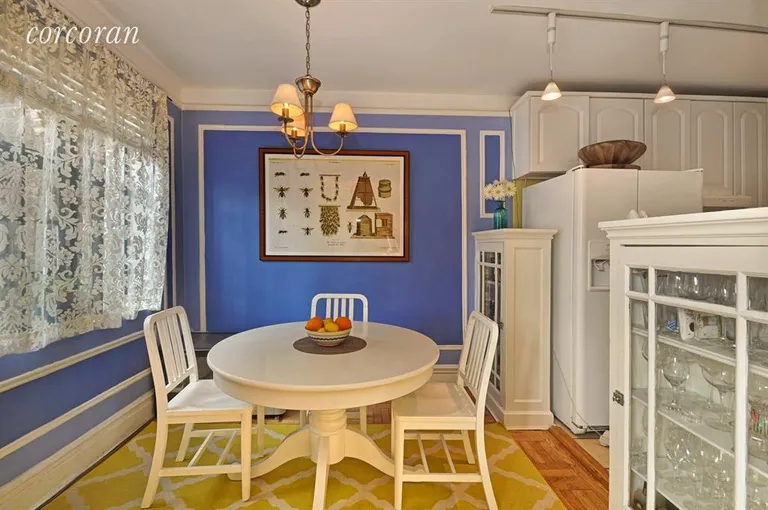 New York City Real Estate | View 116 Pinehurst Avenue, H33 | Dining Room with glass fronted cabinets | View 2