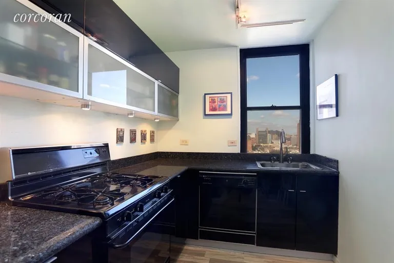 New York City Real Estate | View 301 East 87th Street, 15F | Granite Windowed Kitchen | View 2