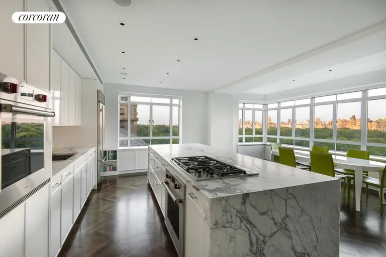 New York City Real Estate | View 25 Central Park West, 12Q | Open Kitchen with Panoramic Views | View 2