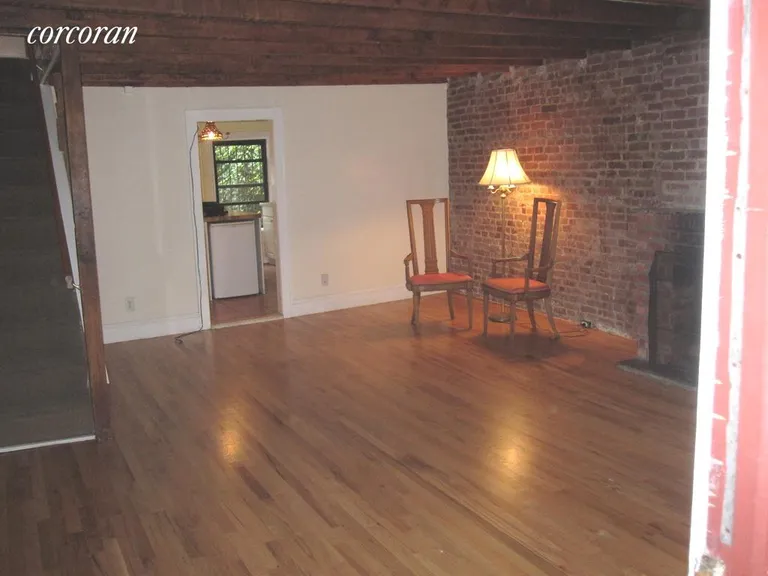 New York City Real Estate | View 208 Wyckoff Street, 1 | Large Living Room with Working Fireplace | View 2