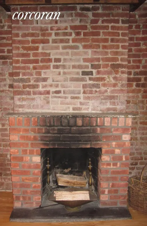 New York City Real Estate | View 208 Wyckoff Street, 1 | Wood Burning Fireplace in Living Room | View 4