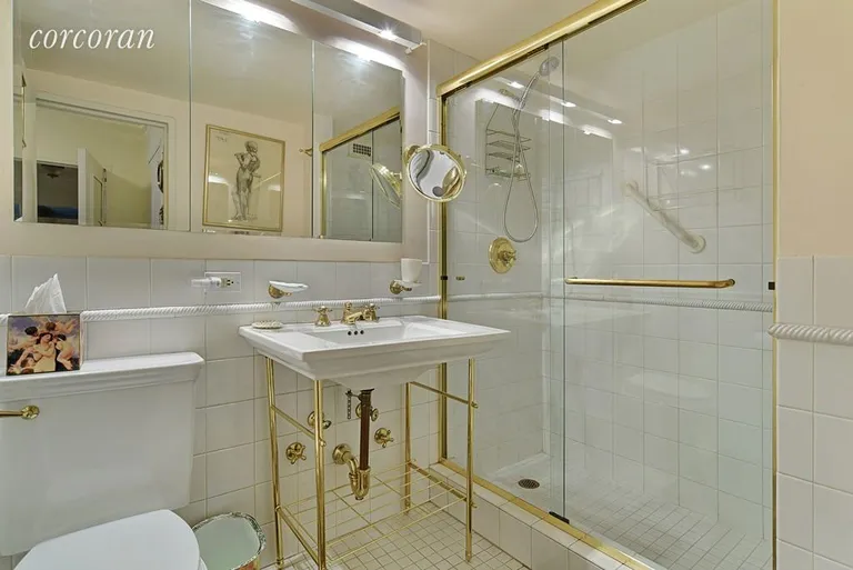 New York City Real Estate | View 70 East 10th Street, 8J | Renovated baths, w/brass ascent fixtures | View 6