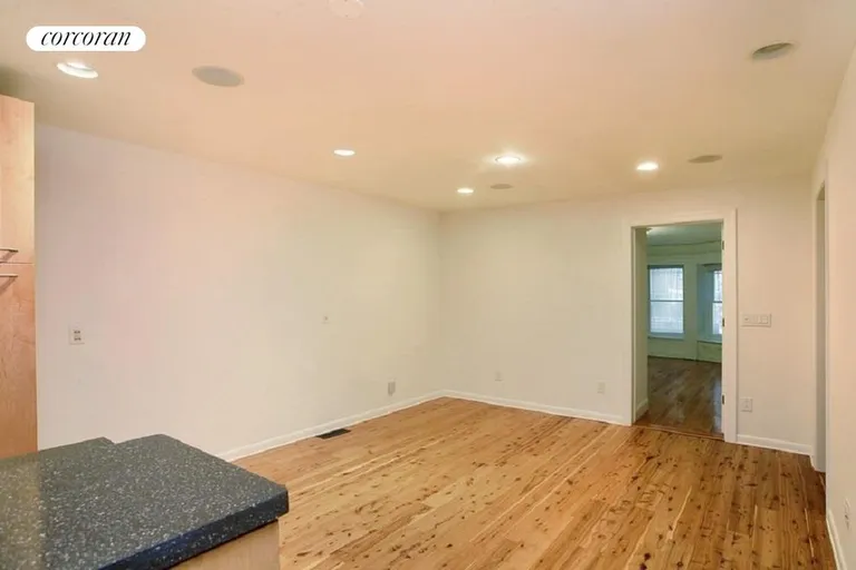 New York City Real Estate | View 834 Lincoln Place, 1 | Large living room with built-in sound system | View 3