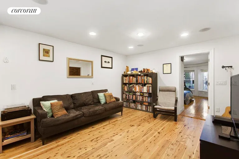 New York City Real Estate | View 834 Lincoln Place, 1 | Large living room with built-in sound system | View 5