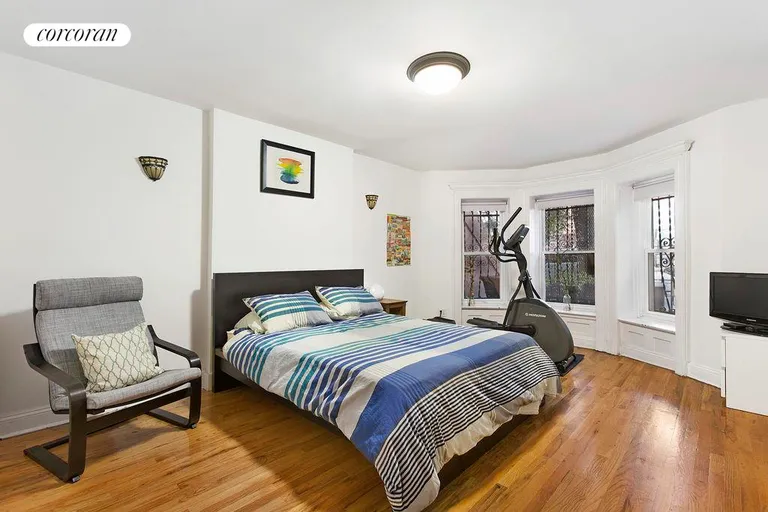New York City Real Estate | View 834 Lincoln Place, 1 | Master bedroom, with space for an office | View 6