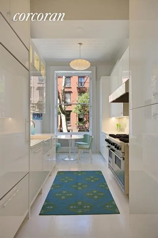 New York City Real Estate | View 281 Henry Street | Custom designed Bilotta kitchen with dining area | View 5