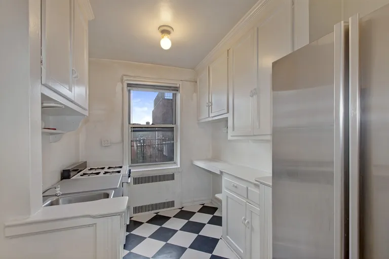 New York City Real Estate | View 9945 67th Road, 615 | Windowed Kitchen | View 2