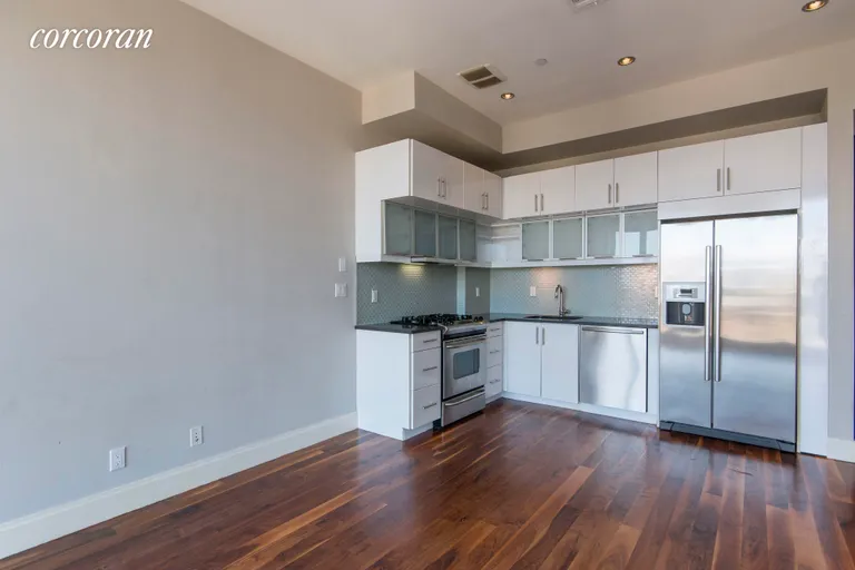 New York City Real Estate | View 655 Washington Avenue, 5B | Living/Dining Area Extends Into Kitchen | View 3