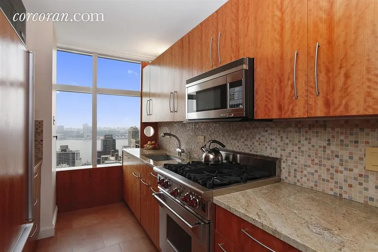 New York City Real Estate | View 160 West 66th Street, 36B | Renovated windowed-kitchen with Hudson River views | View 3