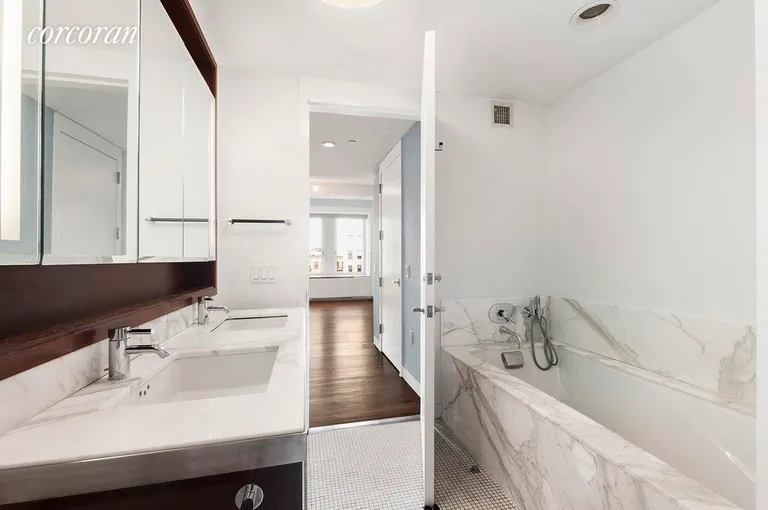 New York City Real Estate | View 225 Lafayette Street, 9A | Master bathroom with Calacatta marble | View 8