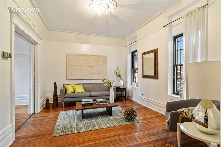 New York City Real Estate | View 120 Clifton Place | Light & bright with two sets of pocket doors | View 2