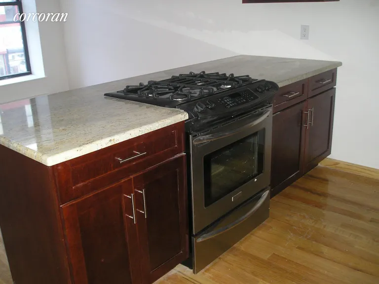 New York City Real Estate | View 592 5th Avenue, 2 | Granite counters and stainless steel appliances | View 9