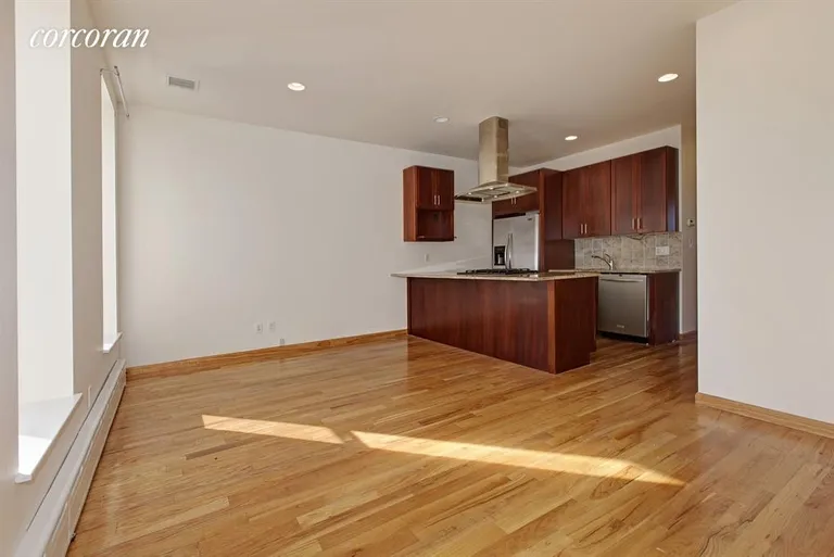 New York City Real Estate | View 592 5th Avenue, 2 | Open Kitchen and Great Room Flooded with Sunlight | View 2