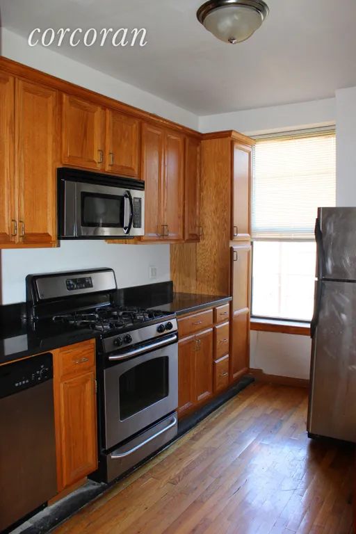 New York City Real Estate | View 291 Nostrand Avenue, 2 | Kitchen with Stainless Steel appliances | View 3