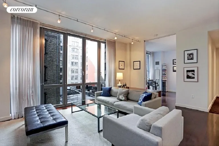 New York City Real Estate | View 4 West 21st Street, 7A | Living Room with Floor to Ceiling Windows  | View 2