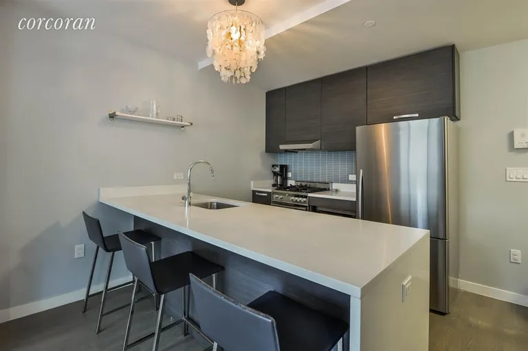 New York City Real Estate | View 1638 8th Avenue, 1E | Kitchen with Breakfast Bar | View 4