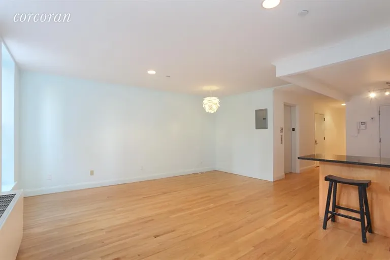 New York City Real Estate | View 203 West 122nd Street, 3 | Kitchen / Living Room | View 4