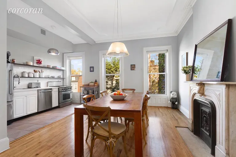 New York City Real Estate | View 127 Park Place, 2 | Wide Open Kitchen and Dining w Decorative Mantle | View 3