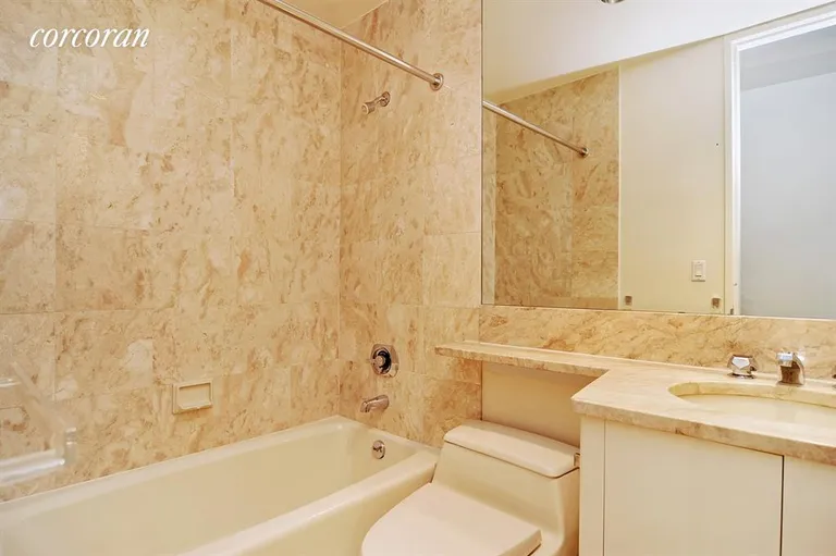 New York City Real Estate | View 100 United Nations Plaza, 14E | Marble Bathroom | View 4