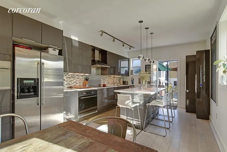 New York City Real Estate | View 33 East 2nd Street | Plenty of space around this hearty hearth  | View 4