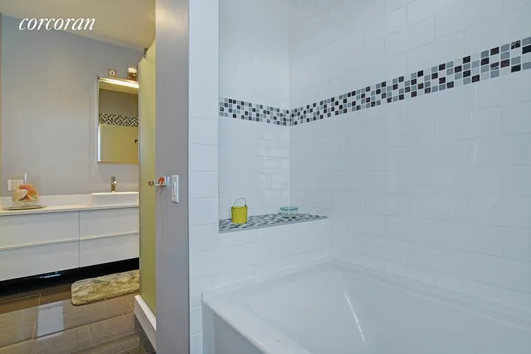 New York City Real Estate | View 33 East 2nd Street | Shared hall bath w/ soaking tub and walk in shower | View 6