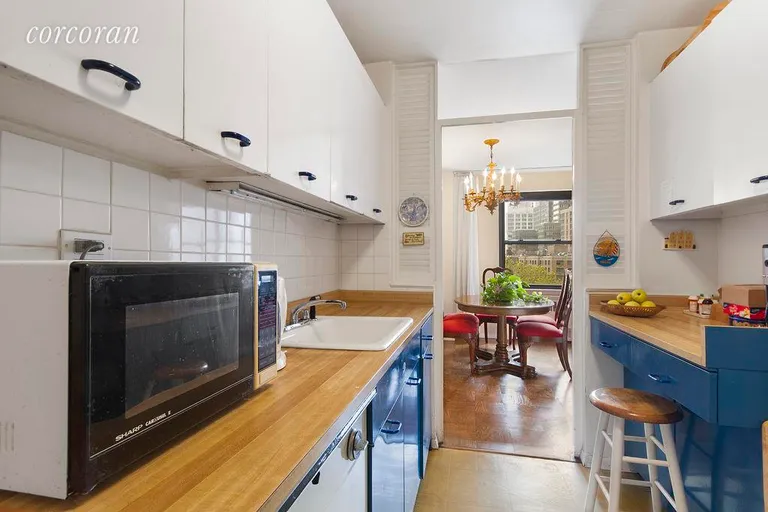 New York City Real Estate | View 205 West End Avenue, 6C | Galley Kitchen with Easy Access to Dining Area | View 6