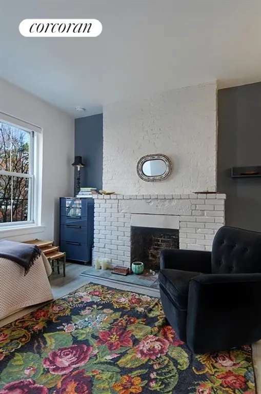 New York City Real Estate | View 92 Horatio Street, 4E | Exposed brick, decorative fireplace | View 4