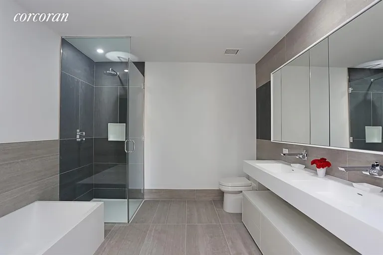New York City Real Estate | View 540 West 49th Street, 301S | Master Bath with deep tub and separate shower. | View 4