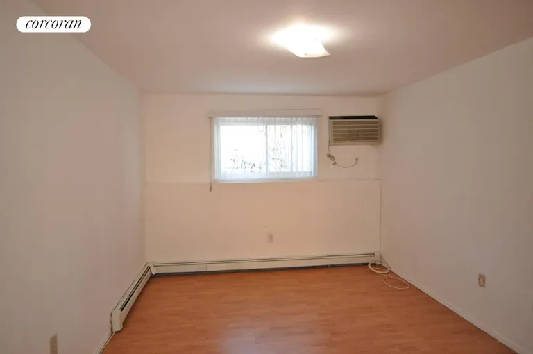 New York City Real Estate | View 2519 Lodovick Avenue, 1 | Master Bedroom with Half Bath & 2 closets | View 6