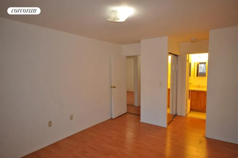 New York City Real Estate | View 2519 Lodovick Avenue, 1 | Master Bedroom with Half Bath & 2 closets | View 7