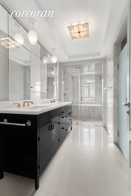 New York City Real Estate | View 21 East 61st Street, 10B | Master Bathroom | View 5