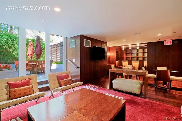 New York City Real Estate | View 250 East 53rd Street, 406 | Resident's lounge with landscaped garden | View 7